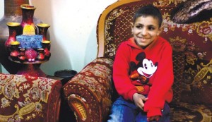 Ahmed Abu Rimaileh, osmiletý klučina, který přiznal, že když ho zatkli, rozplakal se. (Foto Haaretz)